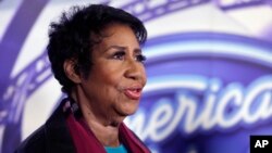 FILE - Singer Aretha Franklin is interviewed after a taping for American Idol XIV at The Fillmore Detroit, March 4, 2015.