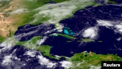 Tropical Storm Joaquin is seen approaching the Bahamas in this NOAA Goes-East satellite image taken Sept. 29, 2015. 