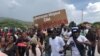 Protesters in Titanyen, a town near Port-au-Prince, Haiti, take to the streets Oct. 19, 2021, to demand the release of the 17 missionaries who were kidnapped by the 400 Mawozo gang on Saturday. (Matiado Vilme / VOA Creole)