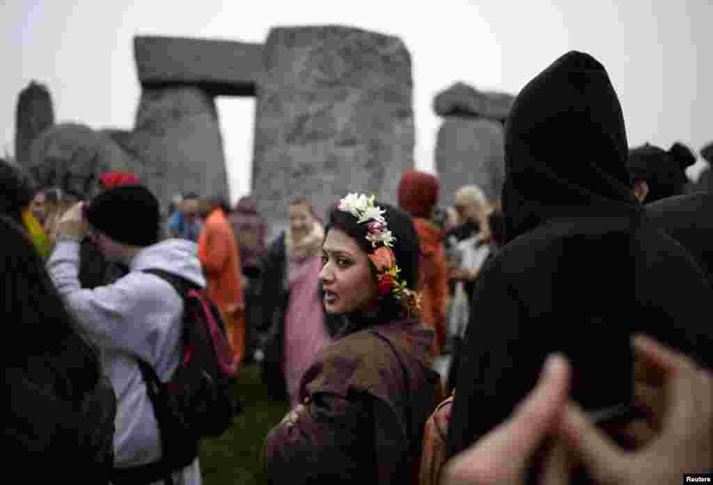 Revellers celebrate the summer solstice at the ancient Stonehenge monument on Salisbury Plain in southern England. Druids, a pagan religious order dating back to Celtic Britain, believe Stonehenge was a center of spiritualism more than 2,000 years ago. 