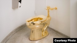 The Guggenheim Museum in New York has installed an 18-carat, solid gold toilet that patrons can use. (Guggenheim)