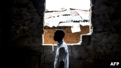 Un ancien enfant soldat, affilié à la milice antigouvernementale locale, Kamuina Nsapu, à Kananga. le 19 octobre 2017.