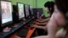 [FILE] People play online games in an internet cafe in downtown Shanghai August 6, 2009. 