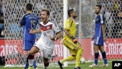 Germany's Mario Goetze celebrates after scoring on Argentina goalkeeper Sergio Romero during the World Cup final soccer match at the Maracana Stadium in Rio de Janeiro, Brazil, July 13, 2014. If Germany wins again in 2026, it will be the best among 48 teams.