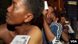 Pekerja migran ilegal asal Indonesia menunggu dideportasi dari Malaysia tahun 2005 silam. IOM merekomendasi pemerintah untuk membuat berbagai kebijakan guna mengatasi masalah kesehatan migran (foto:dok).