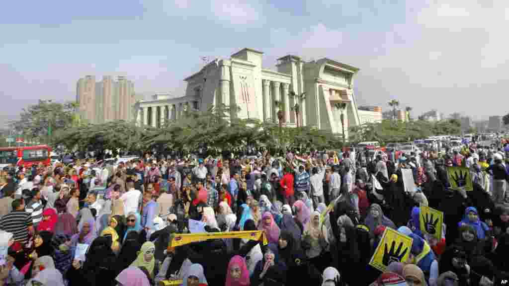 Supporters of Egypt's ousted President Mohammed Morsi protest Morsi's trial in front of the supreme constitutional court in Cairo, Egypt, Nov. 4, 2013. 