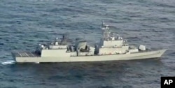 In this image made from video released, Dec. 28, 2018, by the Japan Maritime Self-Defense Force, a South Korean naval warship is seen as it allegedly locks its fire-control radar on a Japanese warplane, Dec. 21, 2018, in the disputed waters north of Japan.