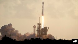 A Falcon 9 SpaceX rocket carrying a classified satellite for the National Reconnaissance Office lifts off from pad 39A at the Kennedy Space Center in Cape Canaveral, Fla., Monday, May 1, 2017.