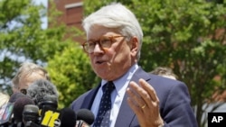 FILE - Attorney Greg Craig is seen prior to a court appearance in Winston-Salem, N.C., June 3, 2011. 