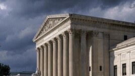 In this June 8, 2021 photo, the Supreme Court is seen in Washington. (AP Photo/J. Scott Applewhite)