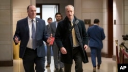 Rep. Dan Kildee, D-Mich (L), and Rep. Sean Patrick Maloney, D-N.Y., arrive for a classified security briefing on the killing of Jamal Khashoggi and Saudi Arabia's war in Yemen, on Capitol Hill in Washington, Dec. 13, 2018. 