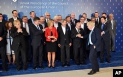 Boris Johnson, Foreign Secretary of Britain, front right, arrives for a group photo during an informal meeting of EU Foreign Ministers in Bratislava, Slovakia, Sept. 2, 2016.