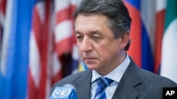 Ukraine's U.N. Ambassador Yuriy Sergeyev pauses during a news conference following an U.N. Security Council meeting on his country's political crisis, Saturday, March 1, 2014, in the United Nations headquarters.