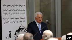 FILE - Palestinian President Mahmoud Abbas speaks at the opening of a museum for late Palestinian leader Yasser Arafat in the West Bank city of Ramallah on Sunday, Nov. 9, 2014.