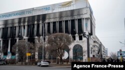 Kazakh soldiers patrol and conduct security controls on pedestrians in Almaty on Jan. 10, 2022, following violent protests over the price increase of the fuel. 