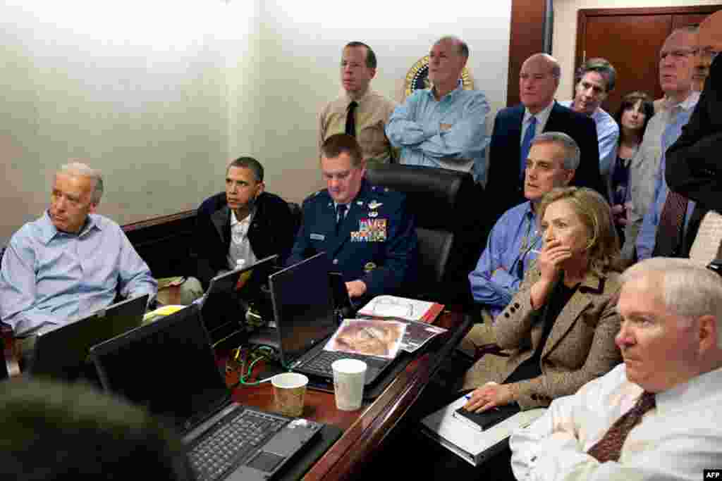 May 1: President Barack Obama and Vice President Joe Biden, along with members of the national security team, receive an update on the mission against Osama bin Laden in the Situation Room of the White House. (White House photo by Pete Souza)