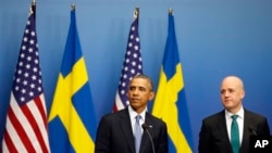 President Obama and Swedish Prime Minister Frederik Reinfeldt talked to reporters in Stockholm