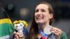 Tatjana Schoenmaker of South Africa poses with her silver medal after the final of the women&#39;s 100-meter breaststroke at the 2020 Summer Olympics, Tuesday, July 27, 2021, in Tokyo, Japan. (AP Photo/Matthias Schrader)