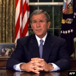 President George W. Bush addressing the nation from the Oval Office in the White House after the attacks