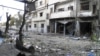 Activists Accuse Pro-Syrian Forces of Killing Scores in Homs