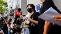 Hang Tung Chow, vice chairwoman of the Hong Kong Alliance in Support of Patriotic Democratic Movements of China, arrives at police headquarters in response to a National Security Department request regarding allegations of foreign agents, in Hong Kong, Sept. 7, 2021.