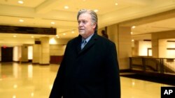 Former White House strategist Steve Bannon leaves a House Intelligence Committee meeting where he was interviewed behind closed doors on Capitol Hill, Jan. 16, 2018, in Washington.