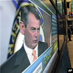 US Rep. John Boehner, R-Ohio, is seen on a television screen on the floor of the New York Stock Exchange, 03 Nov 2010