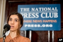 FILE - Nadia Murad, co-recipient of the 2018 Nobel Peace Prize, speaks at a news conference at the National Press Club in Washington, Oct. 8, 2018.