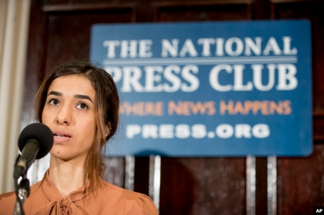 FILE - Nadia Murad, co-recipient of the 2018 Nobel Peace Prize, speaks at a news conference at the National Press Club in Washington, Oct. 8, 2018.