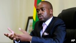 In this March 8, 2018 photo, the leader of MDC-T, Zimbabwe's biggest opposition party, Nelson Chamisa gestures during an interview with the Associated Press in Harare. 