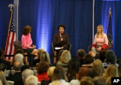 U.S. Treasurer Jovita Carranza, center, talks as former Congresswoman Nan Hayworth, left, and White House senior adviser Ivanka Trump, right, listens during a town hall meeting on Tax Reform at the Northampton Township Senior Center in Richboro, Pa., Oct. 23, 2017.