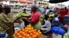 A vendor sells fruit at the large market of Adjame, a popular district of Abidjan, Ivory Coast, Aug. 10, 2017.