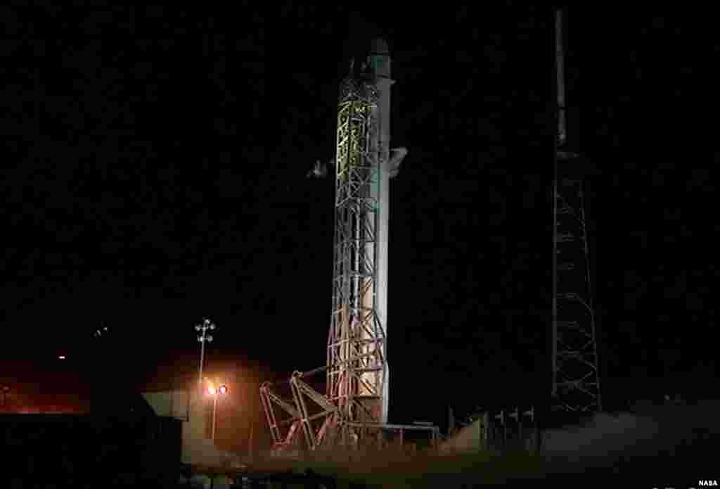 At Cape Canaveral Air Force Station's Space Launch Complex 40, liftoff of the SpaceX Falcon 9 rocket has been postponed. A thrust vector control actuator for the Falcon 9’s second stage failed to perform as expected, resulting in a launch abort, Jan. 6, 2015. (NASA)