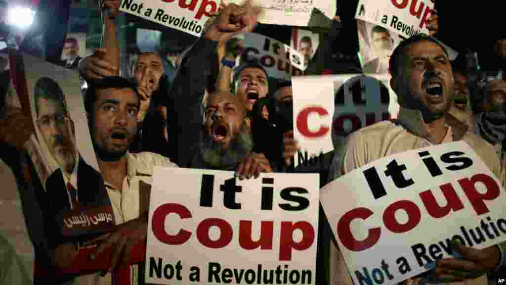 Supporters of Egypt's ousted President Mohamed Morsi pray at Nasr City, July 28, 2013.