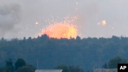 烏克蘭首都基輔以西一個軍事基地的彈藥庫發生劇烈爆炸。