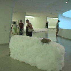 Opposites coexist in these Lee Ufan sculptures where heavy rocks and steel are held in the air by clouds of cotton.