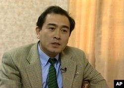 This is an image taken from video taken on April 5, 2004 of Thae Yong Ho, North Korean diplomat speaking during an interview in Pyongyang. North Korea diplomat Thae Yong Ho who was based in London has defected, according to South Korean officials.