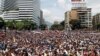 Pristalice Huana Guaida (Foto: REUTERS/Carlos Garcia Rawlins)