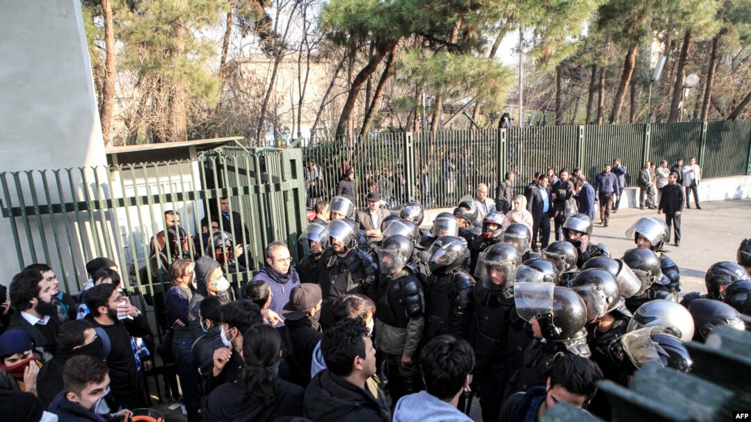 Iranian students scuffle with police at the University of Tehran during a demonstration driven by anger over economic problems, in the capital Tehran on Dec. 30, 2017.