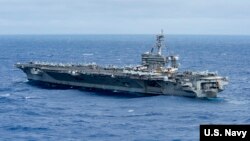 The aircraft carrier USS Carl Vinson (CVN 70) transits the Philippine Sea. (U.S. Navy photo by Mass Communications Specialist 3rd Class Kurtis A. Hatcher/Released)