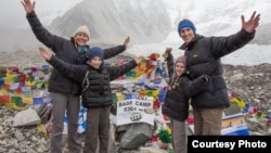 The Rivenbark family at the Everest Base Camp in Nepal, one of many stops on their world tour.
