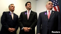 U.S. House Speaker Paul Ryan, center, stands between House Majority Leader Rep. Kevin McCarthy, left, and Majority Whip Rep. Steve Scalise during a news conference on Capitol Hill in Washington, May 11, 2016.
