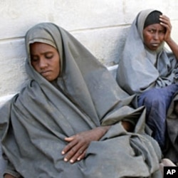 Newly arrived refugees from Barane in Lower Shabelle region in Somalia, rest in the Kenya-Somalia border town of Liboi, July 29, 2011