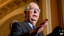 FILE - Senate Minority Leader Mitch McConnell, R-Ky., speaks during a news conference on Capitol Hill in Washington, December 7, 2021.