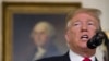 President Donald Trump speaks about the partial government shutdown, immigration and border security in the Diplomatic Reception Room of the White House, in Washington, Jan. 19, 2019.