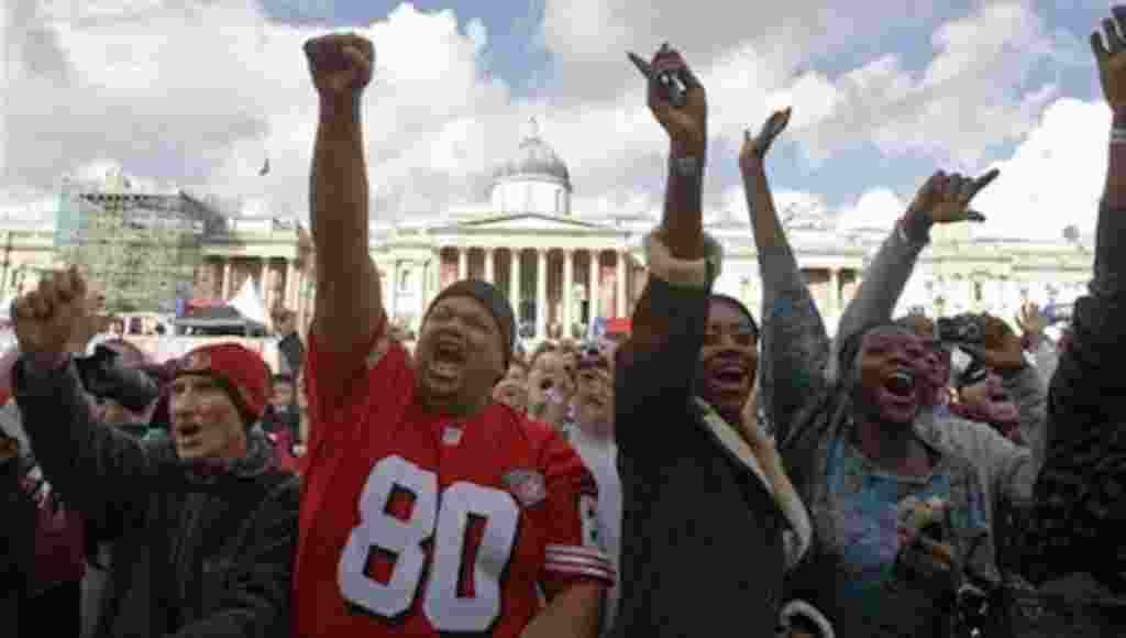 Football fans react during a Fan Rally event at Trafalgar Square in London, Saturday, Oct. 30, 2010, on the eve of an NFL football match between San Francisco 49ers and Denver Broncos at Wembley Stadium on Sunday.