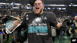 Philadelphia Eagles' Nate Gerry celebrates after the NFL Super Bowl 52 football game against the New England Patriots Sunday, Feb. 4, 2018, in Minneapolis. The Eagles won 41-33.
