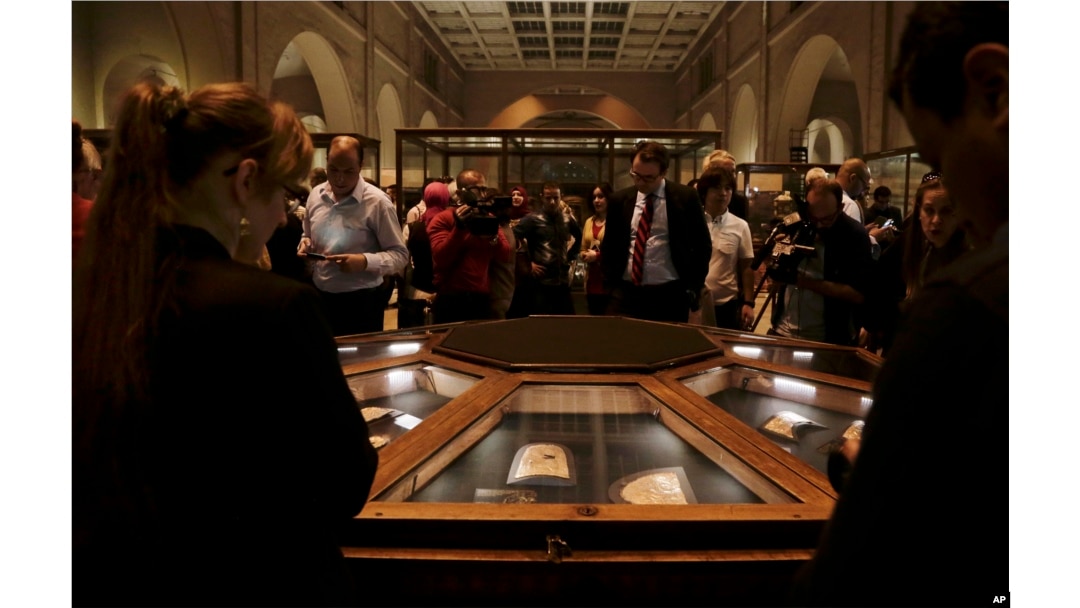 Ancient Egyptian artifacts are displayed in glass cases during the opening of the exhibition entitled Tutankhamun's Unseen Treasures, Nov. 15, 2017.