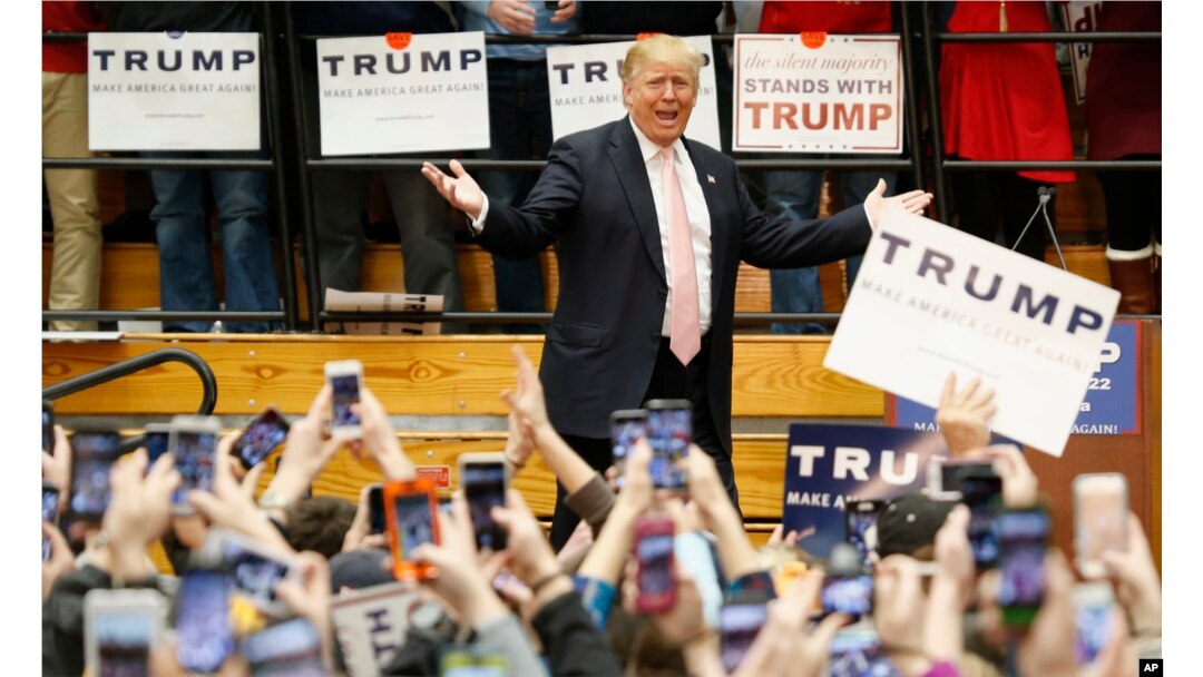 Republican presidential candidate Donald Trump gestures during a rally at Radford University in Radford, Va., Feb. 29, 2016.