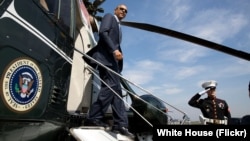 FILE - President Barack Obama disembarks Marine One. (Official White House Photo by Pete Souza)
